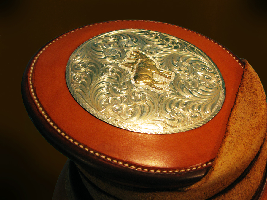 Schaezlein silver, Pecetti 10k gold filled figure, Hermann Oak leather, eight stitches to the inch polished and waxed linen thread, hot bees-waxed edges.